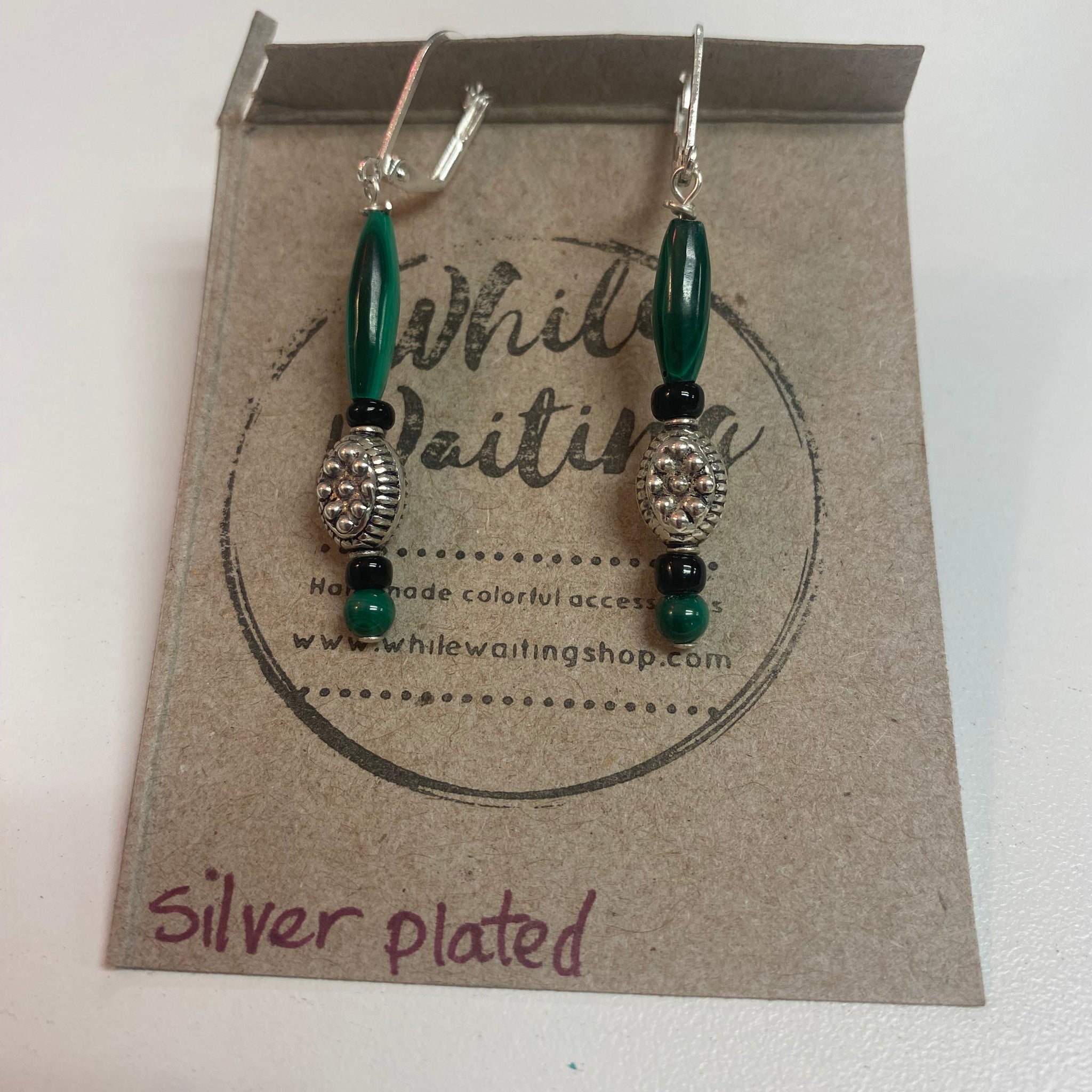 While waiting silver dangle earrings